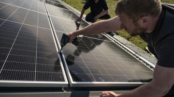 Image of The Good Solar People installing solar panels
